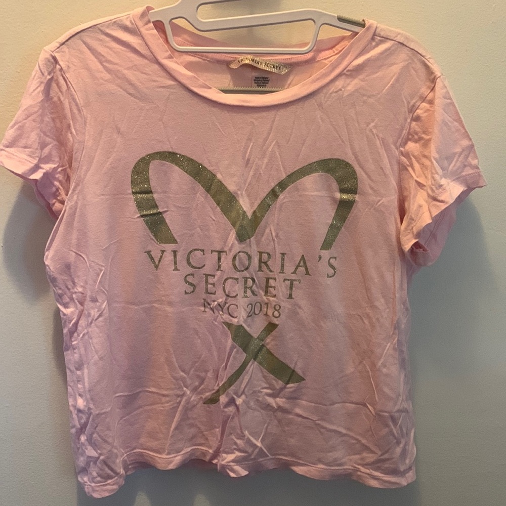 Short sleeve, pink Victoria’s Secret tee shirt. Size Medium!